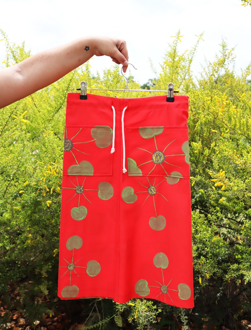 Red lily skirt by Gerred Nabulwad